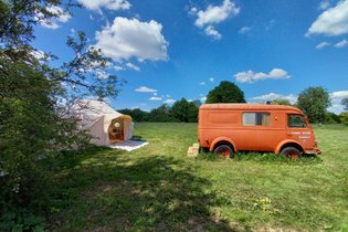 Magic bus with glamping tent