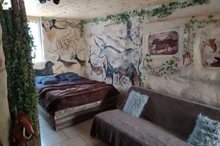 Homoerectus avec  accès au jacuzzi pendant 30 minutes, Petit-déjeuner, repas du soir  & Un massage bien-être 30 minutes par pers